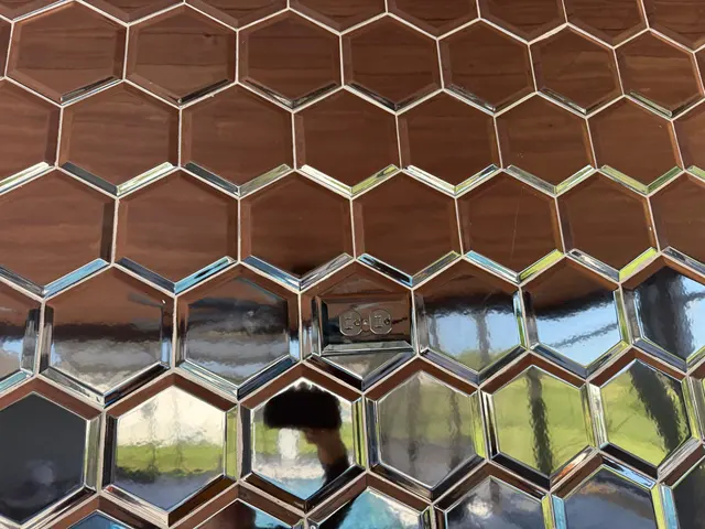 Feature wall built from mirrored hexagon tile